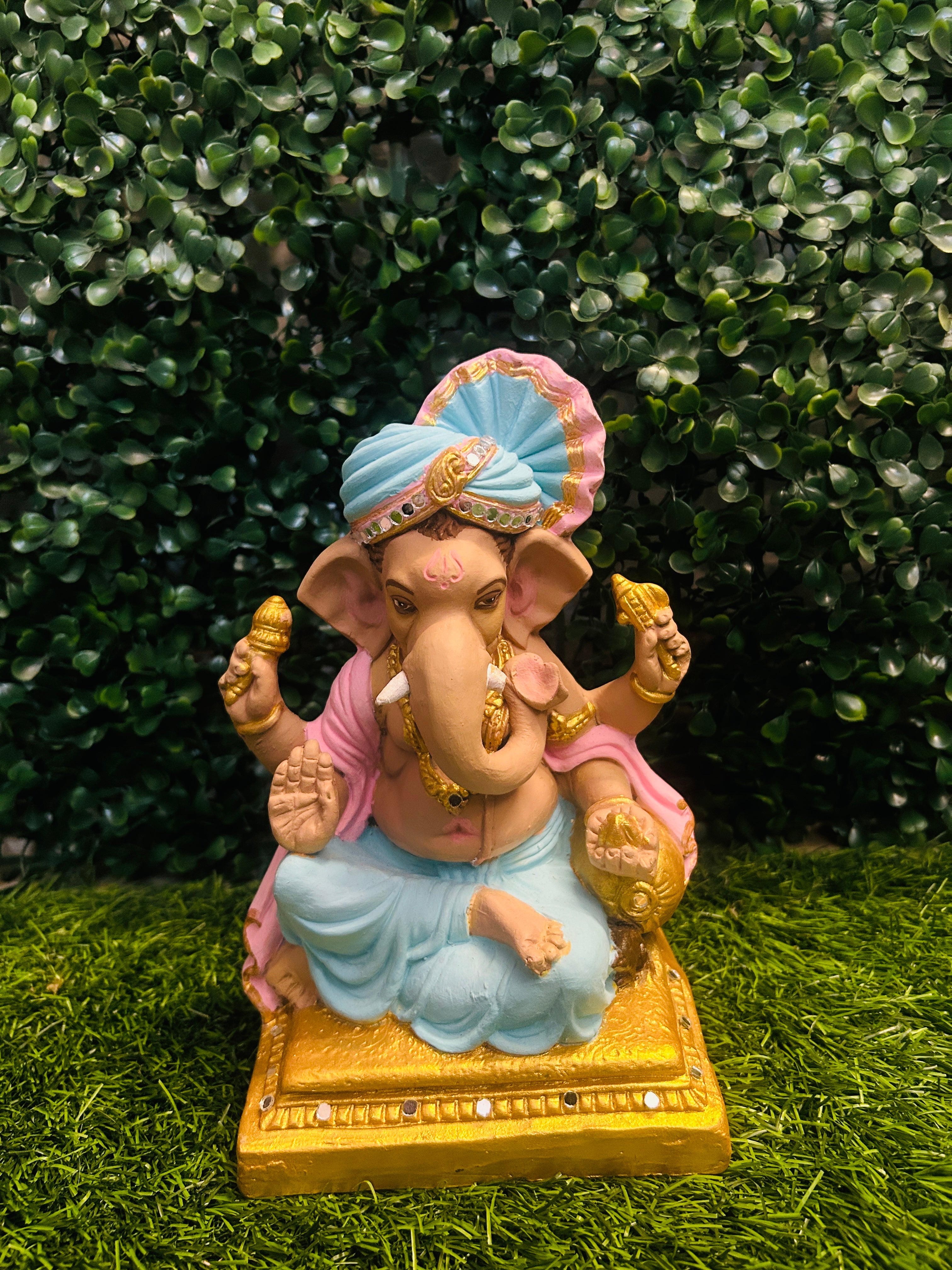 Serene Ganesha on Golden Pedestal