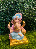 Serene Ganesha on Golden Pedestal