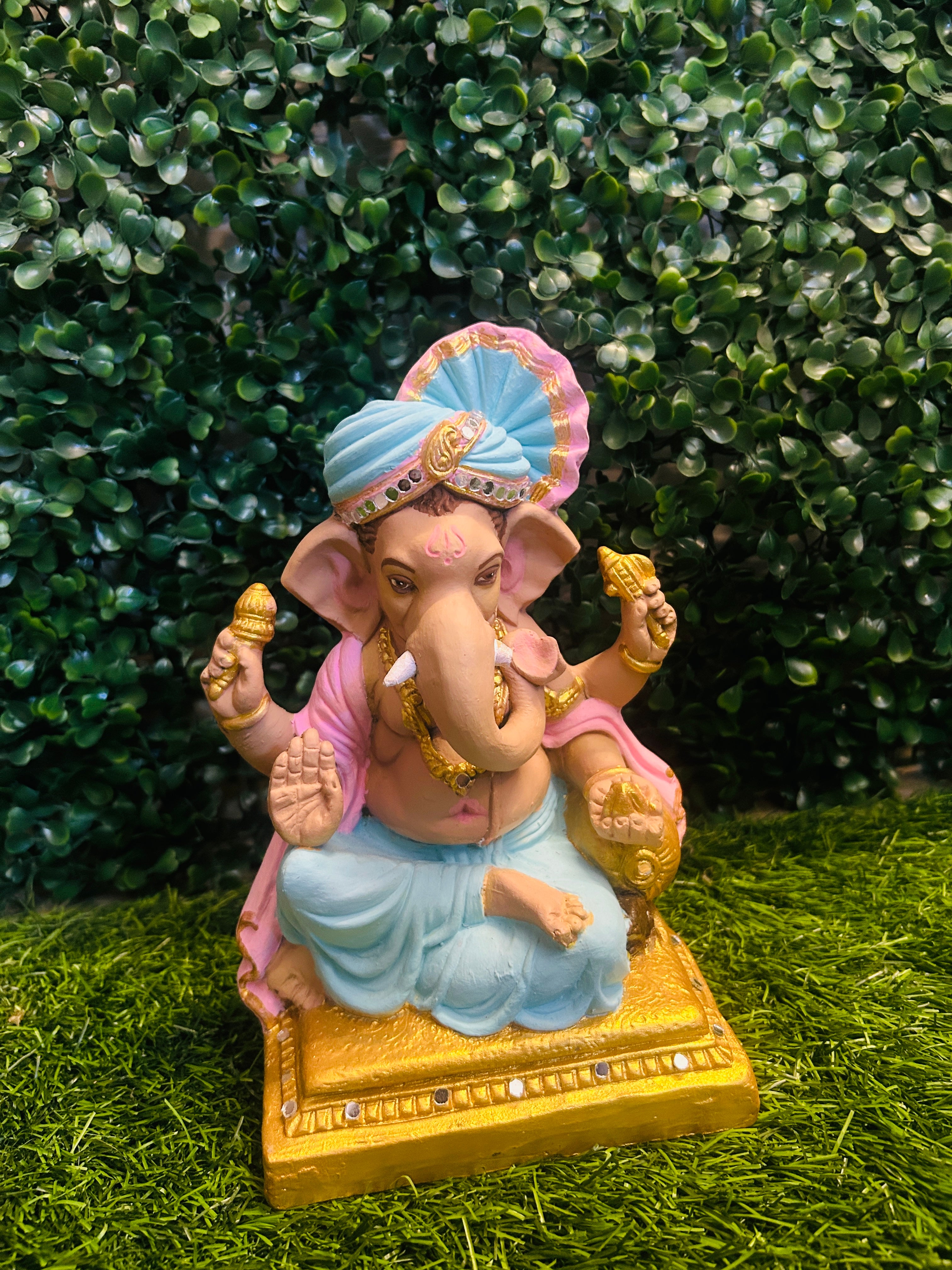 Serene Ganesha on Golden Pedestal